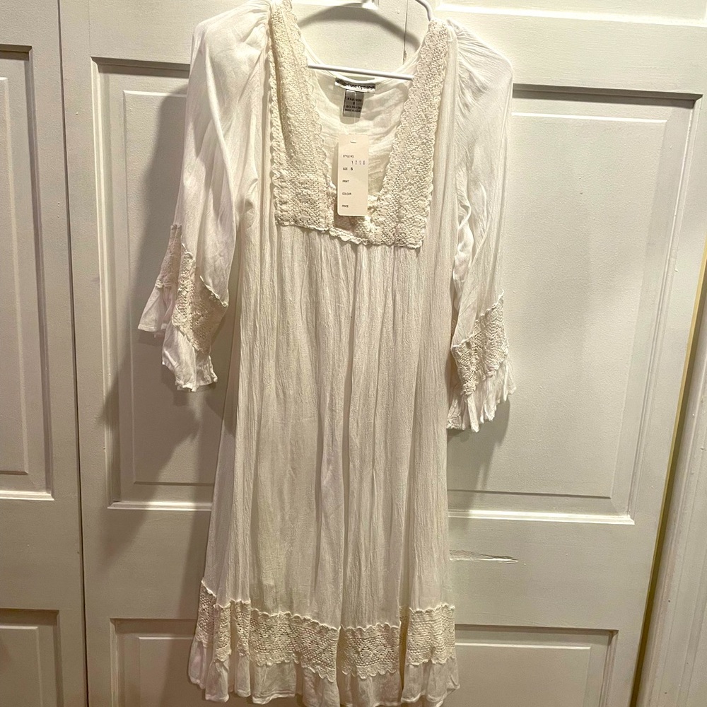 Bohemian long sleeve short White dress. Brand new size small